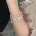 Lily Flower Bracelet in White Gold