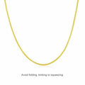 Gold-tone snake chain necklace, 45 cm; avoid folding, kinking or squeezing the chain
