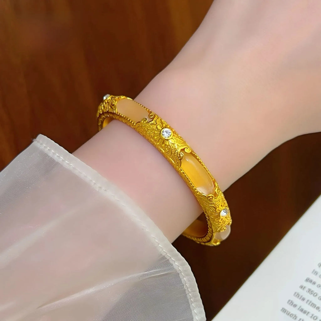 Gold-Tone Filigree Bangle with Jade-Style Inlay — product view 1