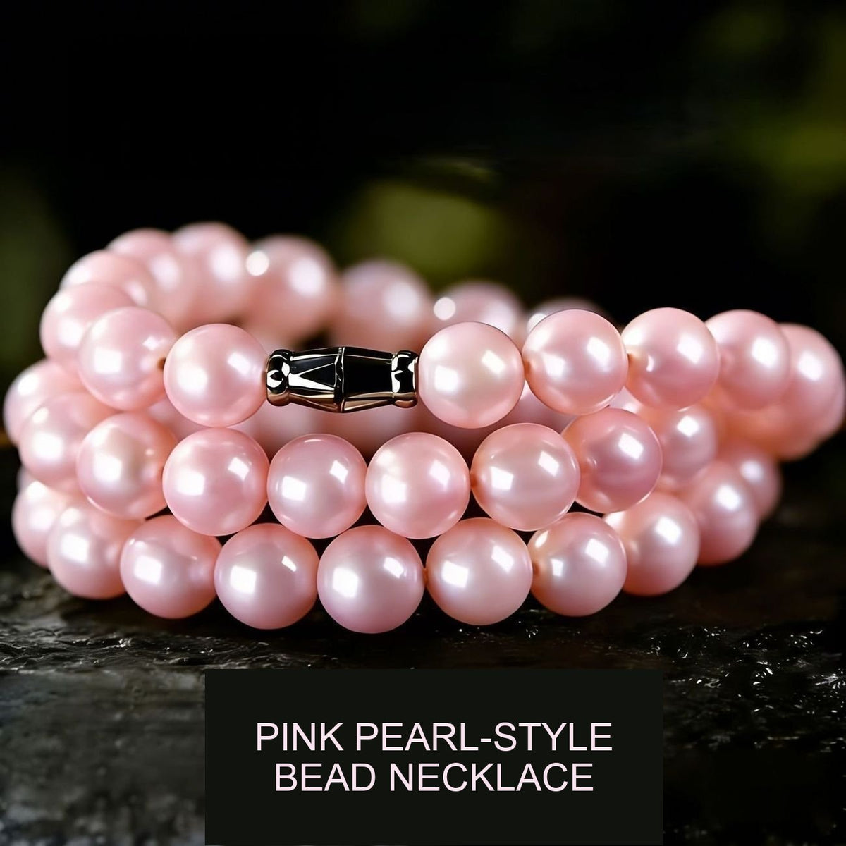 Cherry blossom pink pearl-style bead necklace with a decorative clasp; colour and appearance shown without a pearl-material claim