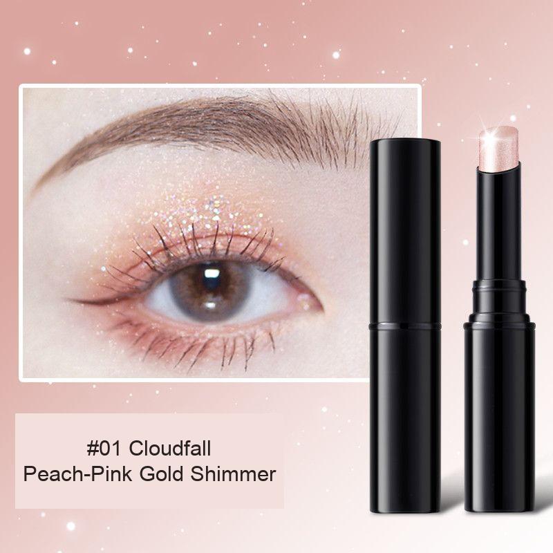 Shade 01 shimmer stick with peach pink gold shimmer shown on the eyelid