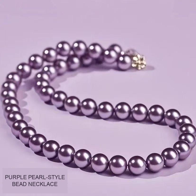 Purple pearl-style bead necklace with a decorative clasp; colour and appearance shown without a pearl-material claim
