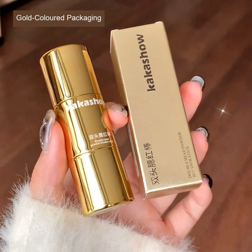 Kakashow double-ended powder blusher stick and matching box in gold-coloured packaging